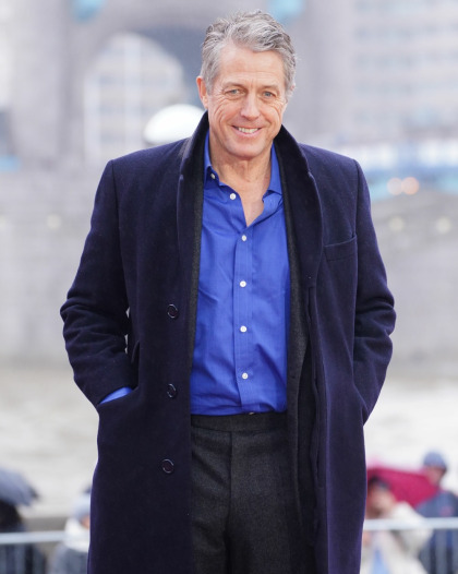 Hugh Grant thanked Taylor Swift for her 'incredible show' & 'gigantic boyfriend'