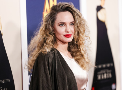 Angelina Jolie went for a curly-haired diva look at the AFI Fest 'Maria' premiere