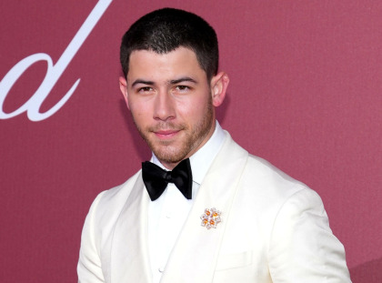 Why in the world is Nick Jonas quote-tweeting his support of Elon Musk??