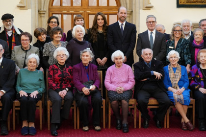 Princess Kate wore all-black & QEII's pearls for Holocaust Remembrance Day