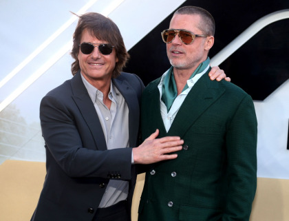 Brad Pitt posed with Ines de Ramon & Tom Cruise at the London 'F1' premiere