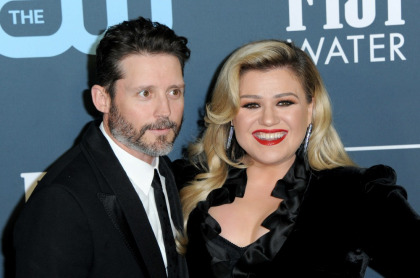Brandon Blackstock had been 'dating' Kelly Clarkson's ex-assistant for years